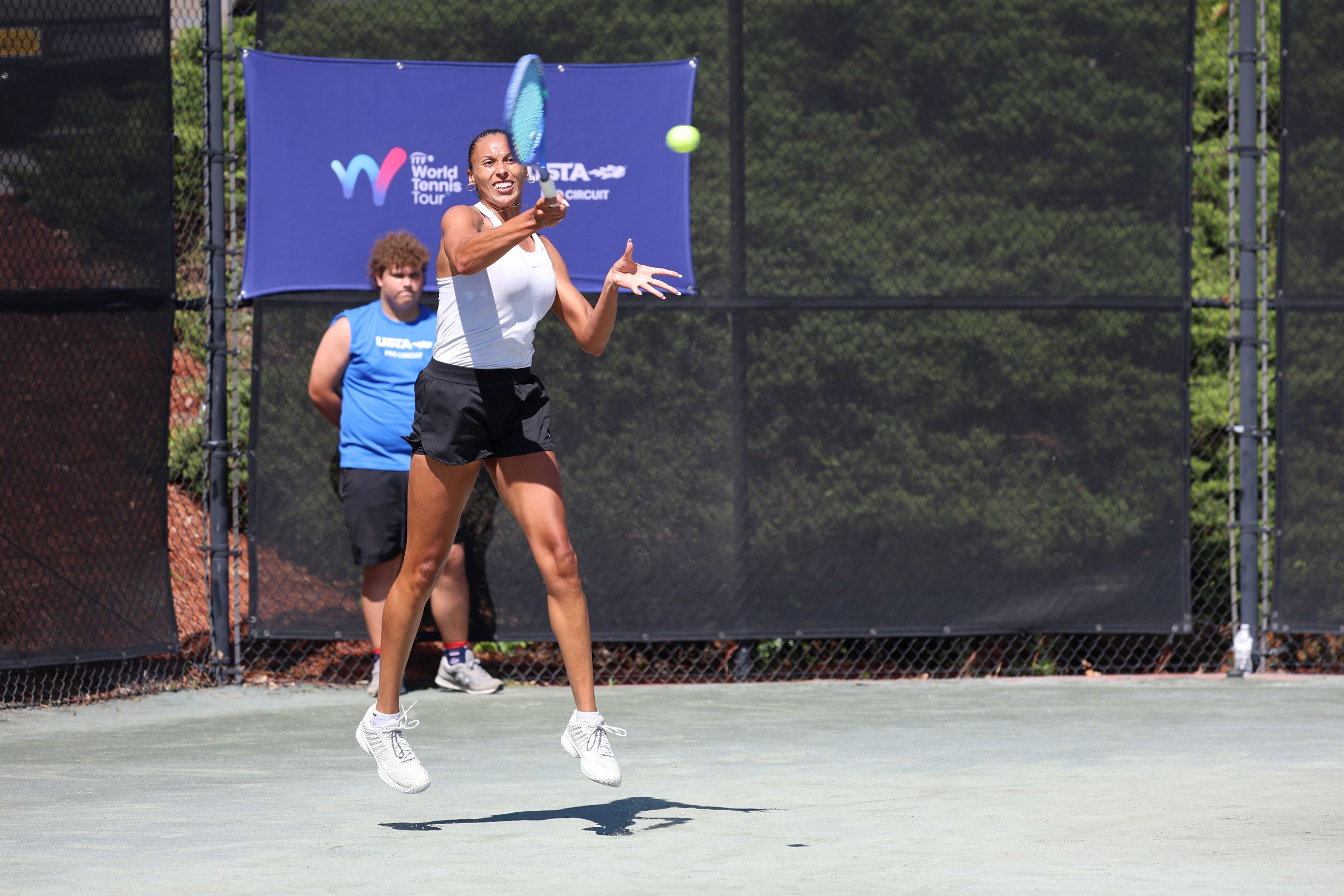 Tennis Player mid swiing